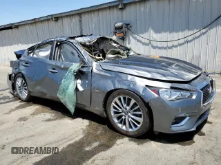 2019 Infiniti Q50 Signature Edition with VIN JN1EV7AP7KM517239, listed as a Copart auction lot 58093944 with 63,177 mi miles and Salvage Title. Bid and sale history available at DreamBid. Image 4.