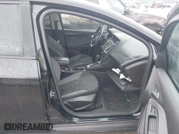 2013 Ford Focus SE with VIN 1FADP3F22DL308840, listed as a IAAI auction lot 42727900 with 112,694 mi miles and . Bid and sale history available at DreamBid. Image 5.