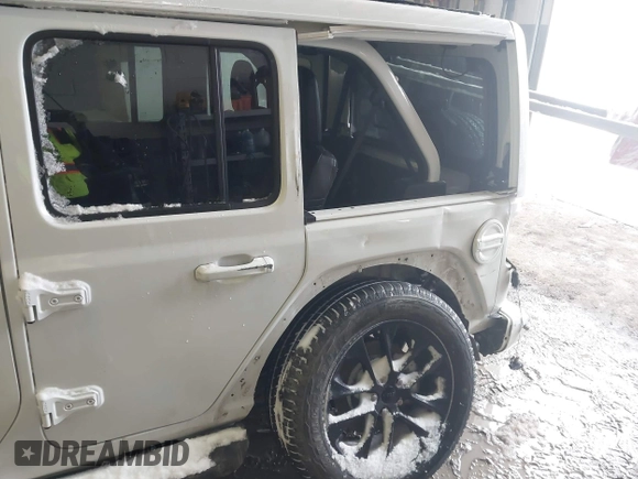 2022 Jeep Wrangler Unlimited Sahara with VIN 1C4HJXEN3NW222744, listed as a IAAI auction lot 41249285 with 43,780 mi miles and . Bid and sale history available at DreamBid. Image 6.