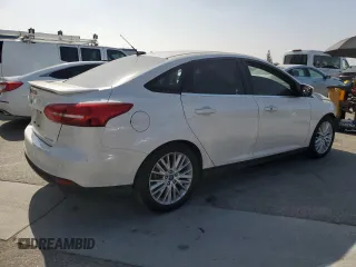 2017 Ford Focus Titanium with VIN 1FADP3J2XHL291606, listed as a Copart auction lot 58268285 with 153,272 mi miles and Salvage title. Bid and sale history available at DreamBid. Image 3.