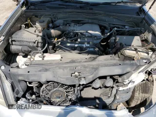 2002 Toyota Land Cruiser z VIN VZJ1210003634, wystawiony jako Copart lot #87504035 z przebiegiem 122 767 mil mil oraz Szkoda całkowita • Salvage title. Historia ofert i sprzedaży dostępna na DreamBid. Obrazek 12.
