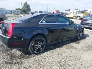 2011 Cadillac CTS Performance with VIN 1G6DL5ED0B0118184, listed as a IAAI auction lot 41721773 with 163,875 mi miles and . Bid and sale history available at DreamBid. Image 4.