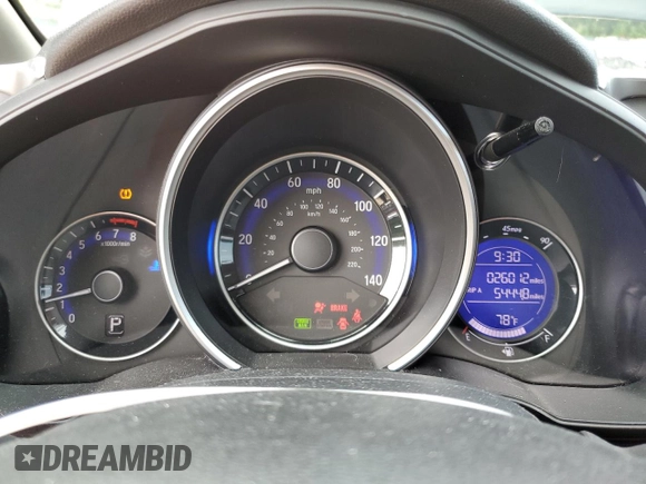 2020 Honda Fit LX с VIN 3HGGK5H44LM700569, выставлен на аукционе Copart как лот 59341665 с пробегом 26 012 миль миль и Списание • Salvage title. История ставок и продаж доступна на DreamBid. Изображение 9.