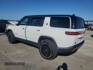 2025 Rivian R1S Adventure z VIN 7PDSGBBA3SN046975, wystawiony jako Copart lot #42880125 z przebiegiem Nie podano mil oraz Szkoda całkowita • Salvage title. Historia ofert i sprzedaży dostępna na DreamBid. Obrazek 2.