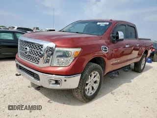 2016 Nissan Titan SL z VIN 1N6BA1F4XGN500750, wystawiony jako Copart lot #57608135 z przebiegiem 126 525 mil mil oraz Czysty tytuł • Clean title. Historia ofert i sprzedaży dostępna na DreamBid. Obrazek 1.