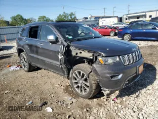 2017 Jeep Grand Cherokee Overland with VIN 1C4RJFCG0HC762612, listed as a Copart auction lot 57400095 with 122,702 mi miles and Salvage title. Bid and sale history available at DreamBid. Image 4.