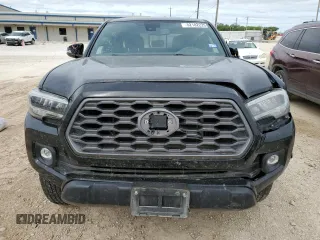2021 Toyota Tacoma SR z VIN 5TFCZ5AN1MX256607, wystawiony jako Copart lot #52182225 z przebiegiem 44 717 mil mil oraz Szkoda całkowita • Salvage title. Historia ofert i sprzedaży dostępna na DreamBid. Obrazek 5.