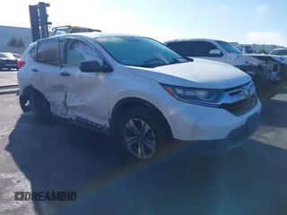 2019 Honda CR-V LX with VIN 2HKRW5H39KH410755, listed as a IAAI auction lot 41729389 with 52,396 mi miles. Bid and sale history available at carsss.com. Image 1.