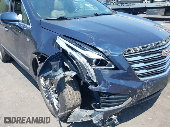 2017 Cadillac XT5 Luxury AWD with VIN 1GYKNDRSXHZ286737, listed as a IAAI auction lot 42428613 with 81,648 mi miles and . Bid and sale history available at DreamBid. Image 6.
