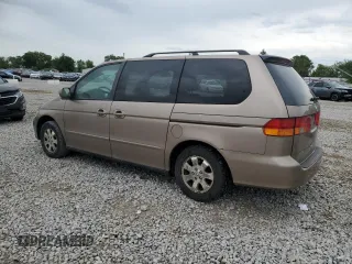 2003 Honda Odyssey EX z VIN 5FNRL186X3B152340, wystawiony jako Copart lot #57883455 z przebiegiem 214 008 mil mil oraz Szkoda całkowita • Salvage title. Historia ofert i sprzedaży dostępna na DreamBid. Obrazek 2.