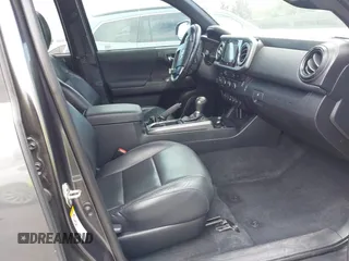 2019 Toyota Tacoma SR with VIN 3TMCZ5AN3KM207783, listed as a IAAI auction lot 42375280 with 55,784 mi miles and . Bid and sale history available at DreamBid. Image 5.