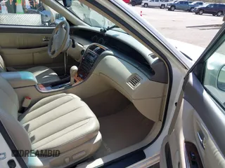 2001 Toyota Avalon XL z VIN 4T1BF28B71U120232, wystawiony jako IAAI lot #42116948 z przebiegiem 196 266 mil mil oraz . Historia ofert i sprzedaży dostępna na DreamBid. Obrazek 5.