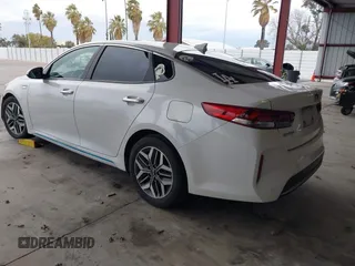 2020 Kia Optima Hybrid EX with VIN KNAGU4LE0L5037393, listed as a IAAI auction lot 41507670 with 54,928 mi miles. Bid and sale history available at carsss.com. Image 3.