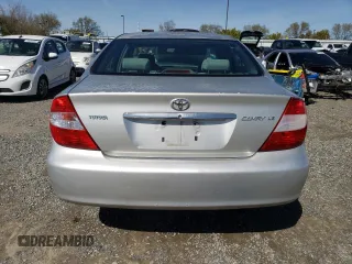 2004 Toyota Camry LE with VIN 4T1BE32K64U936757, listed as a Copart auction lot 49557205 with 232,417 mi miles and Salvage Title. Bid and sale history available at carsss.com. Image 6.