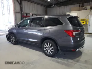 2021 Honda Pilot EX-L with VIN 5FNYF6H53MB044294, listed as a Copart auction lot 57799975 with 59,033 mi miles and Salvage title. Bid and sale history available at DreamBid. Image 2.