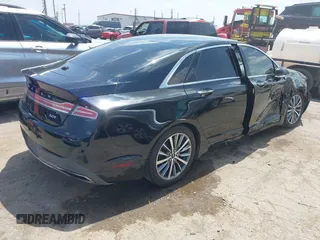 2017 Lincoln MKZ Premiere z VIN 3LN6L5A95HR648064, wystawiony jako IAAI lot #42115558 z przebiegiem 86 701 mil mil oraz . Historia ofert i sprzedaży dostępna na DreamBid. Obrazek 4.