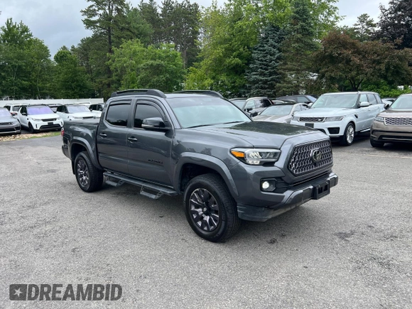 2022 Toyota Tacoma Limited with VIN 3TMGZ5AN7NM458988, listed as a Copart auction lot 65398105 with 32,115 mi miles and Salvage title. Bid and sale history available at DreamBid. Image 1.