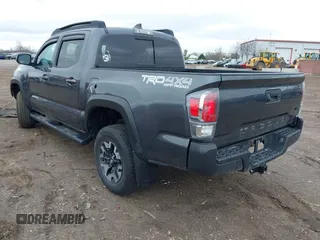 2021 Toyota Tacoma 4WD SR with VIN 3TMCZ5AN2MM406293, listed as a IAAI auction lot 41925585 with 52,243 mi miles. Bid and sale history available at carsss.com. Image 3.