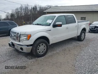 2011 Ford F-150 XLT with VIN 1FTFW1ETXBFD37812, listed as a IAAI auction lot 41748570 with 231,533 mi miles. Bid and sale history available at carsss.com. Image 2.