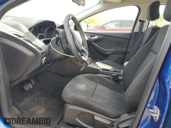 2018 Ford Focus SE z VIN 1FADP3F27JL266774, wystawiony jako Copart lot #56672825 z przebiegiem 51 980 mil mil oraz Szkoda całkowita • Salvage title. Historia ofert i sprzedaży dostępna na DreamBid. Obrazek 7.