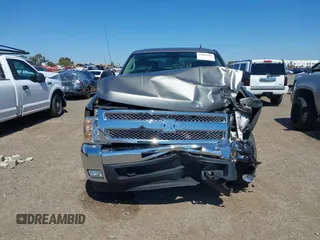 2013 Chevrolet Silverado 1500 LT with VIN 3GCPKSE70DG276707, listed as a IAAI auction lot 41831822 with 127,307 mi miles and . Bid and sale history available at DreamBid. Image 12.