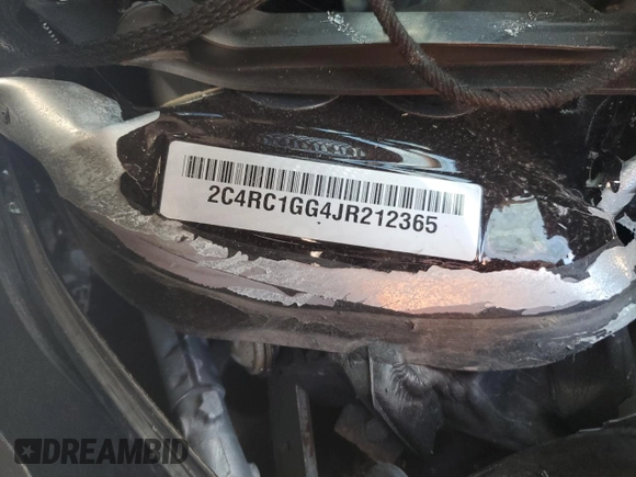 2018 Chrysler Pacifica Limited z VIN 2C4RC1GG4JR212365, wystawiony jako Copart lot #50052575 z przebiegiem Nie podano mil oraz Szkody całkowita. Historia ofert i sprzedaży dostępna na DreamBid. Obrazek 14.