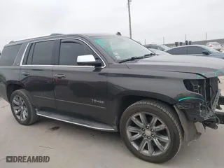 2015 Chevrolet Tahoe LTZ with VIN 1GNSCCKC6FR262769, listed as a IAAI auction lot 41389535 with 196,767 mi miles. Bid and sale history available at carsss.com. Image 13.
