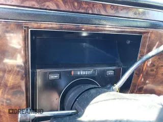 1992 Cadillac Brougham z VIN 1G6DW547XNR703499, wystawiony jako Copart lot #66709103 z przebiegiem Nie podano mil oraz Nie do naprawy. Historia ofert i sprzedaży dostępna na DreamBid. Obrazek 9.