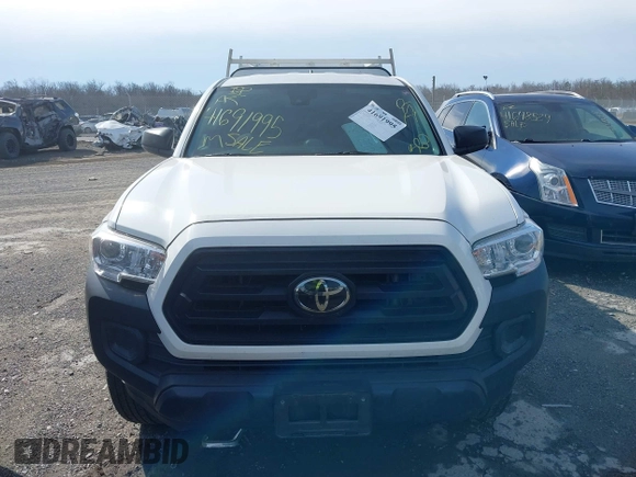 2021 Toyota Tacoma SR with VIN 3TYRX5GN6MT007673, listed as a IAAI auction lot 41691995 with 97,735 mi miles and . Bid and sale history available at DreamBid. Image 6.