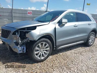 2023 Cadillac XT4 FWD Premium Luxury with VIN 1GYFZCR45PF199216, listed as a IAAI auction lot 42762273 with 54,808 mi miles and . Bid and sale history available at DreamBid. Image 2.