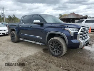 2023 Toyota Tundra 1794 Edition with VIN 5TFMA5AB7PX023918, listed as a Copart auction lot 49638235 with 58,499 mi miles and Salvage title. Bid and sale history available at DreamBid. Image 4.
