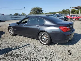 2011 BMW 7 Series 750i with VIN WBAKA8C58BCY37346, listed as a Copart auction lot 65017655 with 125,505 mi miles and Salvage title. Bid and sale history available at DreamBid. Image 2.