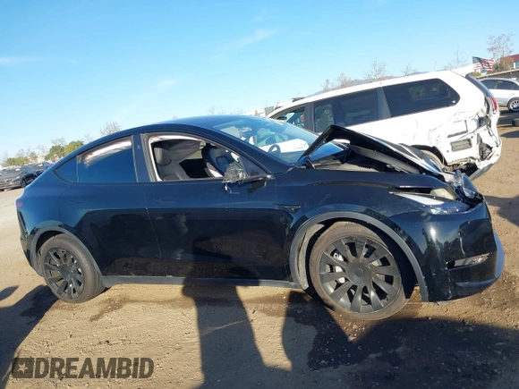 2023 Tesla Model Y Long Range with VIN 7SAYGDEE0PF907260, listed as a IAAI auction lot 41180227 with Not Provided miles and . Bid and sale history available at DreamBid. Image 13.