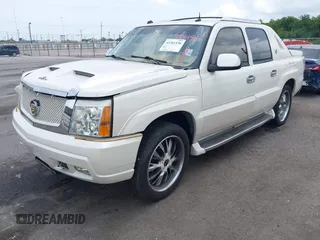 2004 Cadillac Escalade EXT z VIN 3GYEK62N04G123756, wystawiony jako IAAI lot #42361536 z przebiegiem 132 718 mil mil oraz . Historia ofert i sprzedaży dostępna na DreamBid. Obrazek 2.
