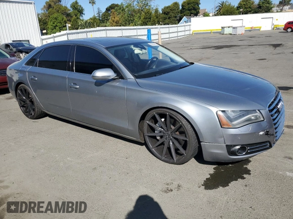 2012 Audi A8 z VIN WAURVAFD7CN023286, wystawiony jako Copart lot #56594745 z przebiegiem 199 443 mil mil oraz Czysty tytuł • Clean title. Historia ofert i sprzedaży dostępna na DreamBid. Obrazek 4.