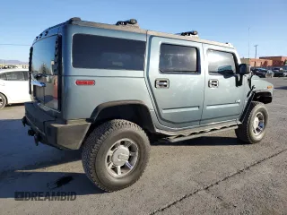 2005 Hummer H2 SUV with VIN 5GRGN23U55H102959, listed as a Copart auction lot 85617144 with 165,513 mi miles and Clean Title. Bid and sale history available at carsss.com. Image 3.