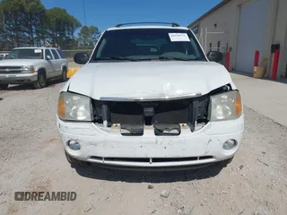 2007 GMC Envoy SLE with VIN 1GKDT13S472223365, listed as a IAAI auction lot 41690531 with 170,539 mi miles. Bid and sale history available at carsss.com. Image 12.