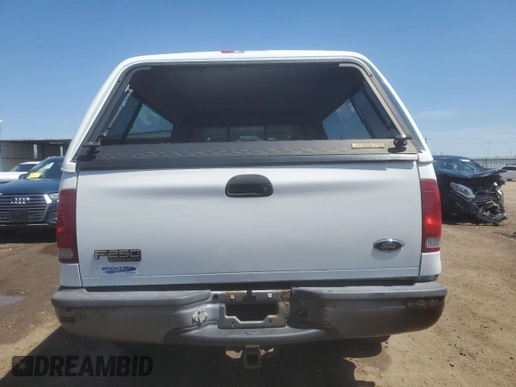 2004 Ford F-250 XL with VIN 1FTNW21L94EC37720, listed as a Copart auction lot 55412095 with 145,255 mi miles and Salvage title. Bid and sale history available at DreamBid. Image 6.