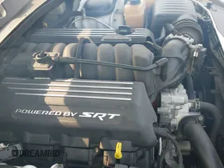 2020 Dodge Charger Scat Pack Widebody with VIN 2C3CDXGJ8LH174847, listed as a IAAI auction lot 42452253 with 57,435 mi miles and . Bid and sale history available at DreamBid. Image 20.