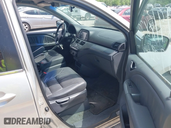 2007 Honda Odyssey EX-L z VIN 5FNRL38797B042602, wystawiony jako IAAI lot #42300656 z przebiegiem 250 000 mil mil oraz . Historia ofert i sprzedaży dostępna na DreamBid. Obrazek 5.