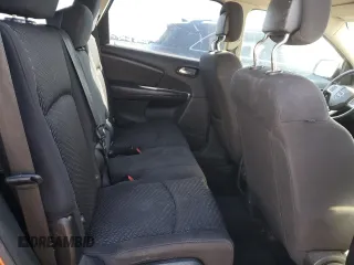 2013 Dodge Journey American Value with VIN 3C4PDCAB4DT590975, listed as a Copart auction lot 55627725 with 212,659 mi miles and Clean Title. Bid and sale history available at DreamBid. Image 11.