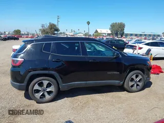 2017 Jeep Compass Latitude with VIN 3C4NJCBB6HT605934, listed as a IAAI auction lot 41846329 with 145,275 mi miles and . Bid and sale history available at DreamBid. Image 14.