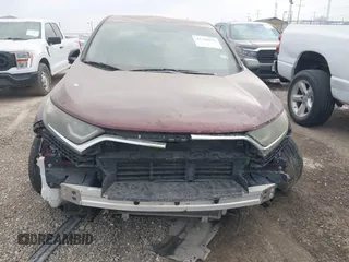 2017 Honda CR-V LX z VIN 7FARW5H3XHE004107, wystawiony jako IAAI lot #42260655 z przebiegiem 92 554 mil mil oraz . Historia ofert i sprzedaży dostępna na DreamBid. Obrazek 12.