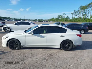 2014 Infiniti Q50 Hybrid Premium with VIN JN1AV7AP2EM690136, listed as a IAAI auction lot 42481510 with 203,832 mi miles and . Bid and sale history available at DreamBid. Image 14.