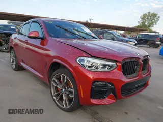 2021 BMW X4 M40i z VIN 5UX2V5C08M9E77880, wystawiony jako IAAI lot #40607823 z przebiegiem 21 146 mil mil oraz . Historia ofert i sprzedaży dostępna na DreamBid. Obrazek 1.
