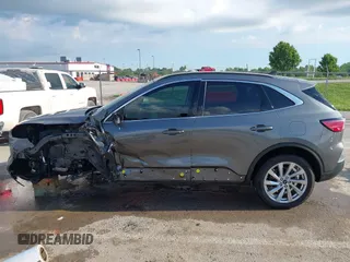 2022 Ford Escape Titanium with VIN 1FMCU9J90NUB35428, listed as a IAAI auction lot 42255369 with 33,662 mi miles and . Bid and sale history available at DreamBid. Image 15.