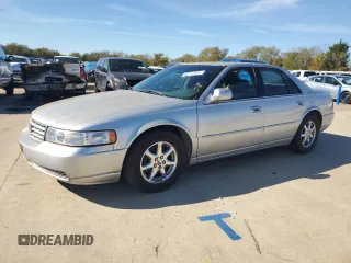 2002 Cadillac Seville Luxury SLS z VIN 1G6KS54Y92U109202, wystawiony jako Copart lot #82247884 z przebiegiem 56 103 mil mil oraz Tytuł czysty. Historia ofert i sprzedaży dostępna na DreamBid. Obrazek 1.