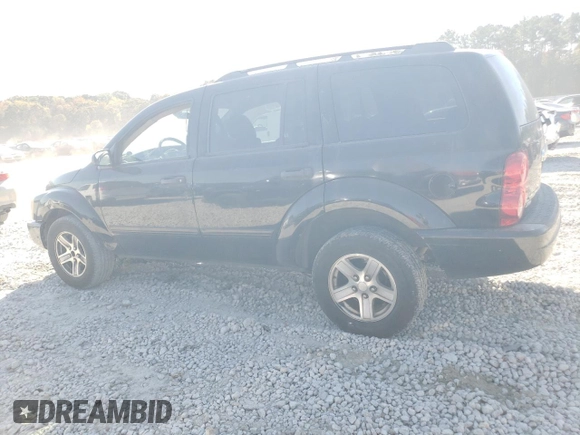 2004 Dodge Durango SLT with VIN 1D4HD48N04F211932, listed as a Copart auction lot 80087524 with 244,552 mi miles and Salvage title. Bid and sale history available at DreamBid. Image 2.