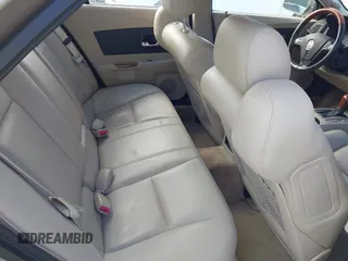 2004 Cadillac CTS with VIN 1G6DM577140148253, listed as a IAAI auction lot 42200021 with 91,599 mi miles and . Bid and sale history available at carsss.com. Image 8.