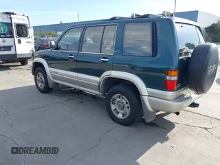 1996 Isuzu Trooper z VIN JACDJ58V4T7918002, wystawiony jako IAAI lot #41700255 z przebiegiem 203 951 mil mil oraz . Historia ofert i sprzedaży dostępna na DreamBid. Obrazek 3.